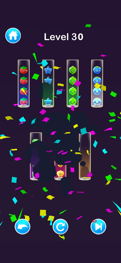 Sort Puzzle & Color Ball Games - Gameplay screen of Sort Puzzle and Color Ball Games showing a completed level thirty with sorted fruit characters in tubes and falling confetti