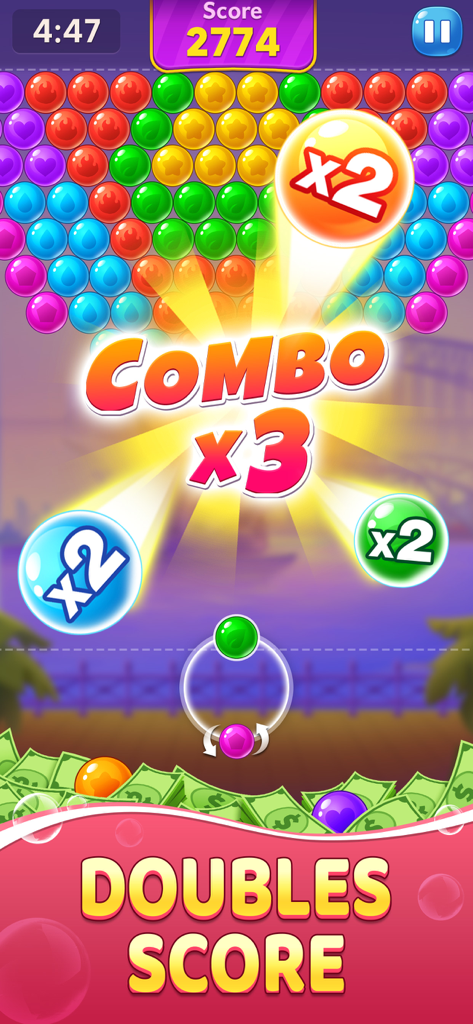 Bubble Clash: Win Real Cash - Gameplay of Bubble Clash showing a triple combo and double score bonus with real cash theme