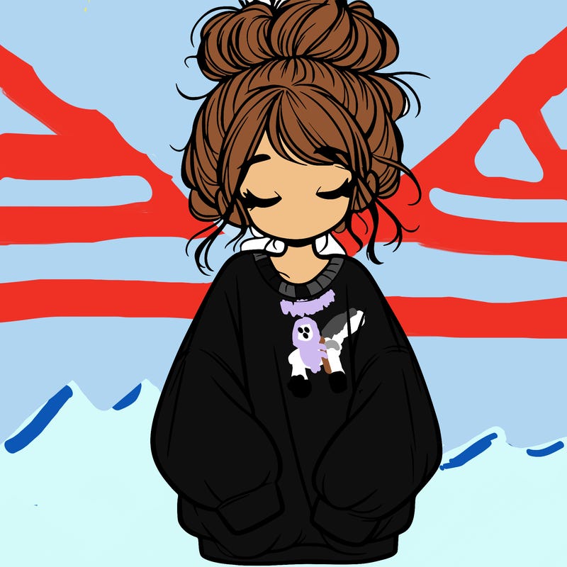 girl with baggy sweatshirt and messy bun