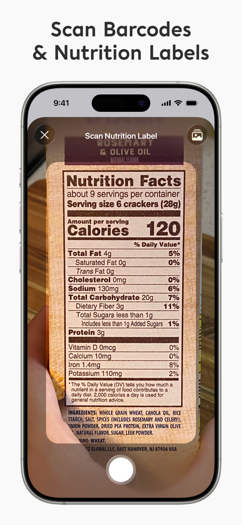 Nutrition Tracker: Foodnoms - An iPhone scanning a nutrition facts label using the Foodnoms app.