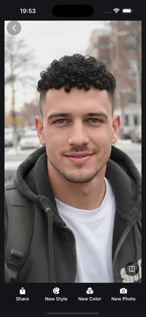 A man testing a new curly hair style on the Hair AI app