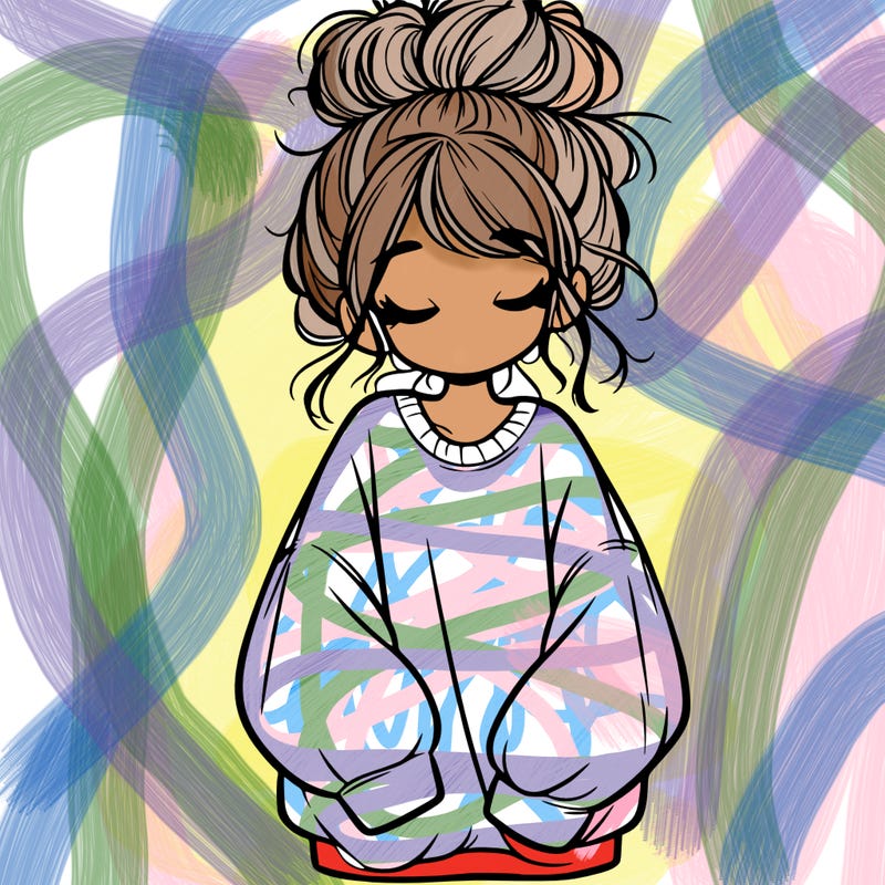 girl with baggy sweatshirt and messy bun