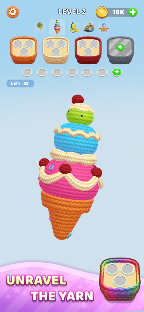 Yarn Feverのゲームプレイ画面。編み物のアイスクリームコーンと糸のソーティングバスケットが特徴