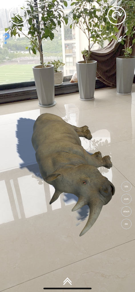 リアルAR拡張現実アプリを使用して、リビングルームの床に投影された3Dサイのモデル。