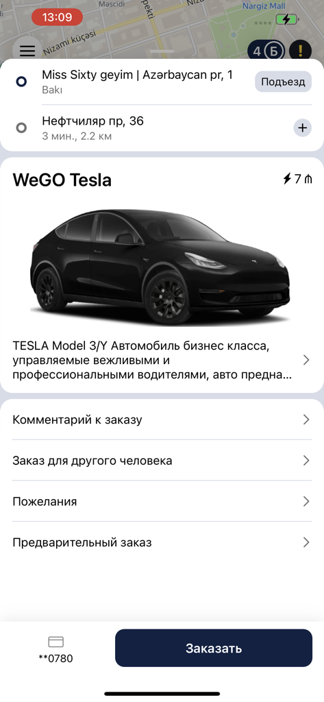 Interfaz de la aplicación móvil WeGO para reservar un viaje en Tesla de clase ejecutiva premium