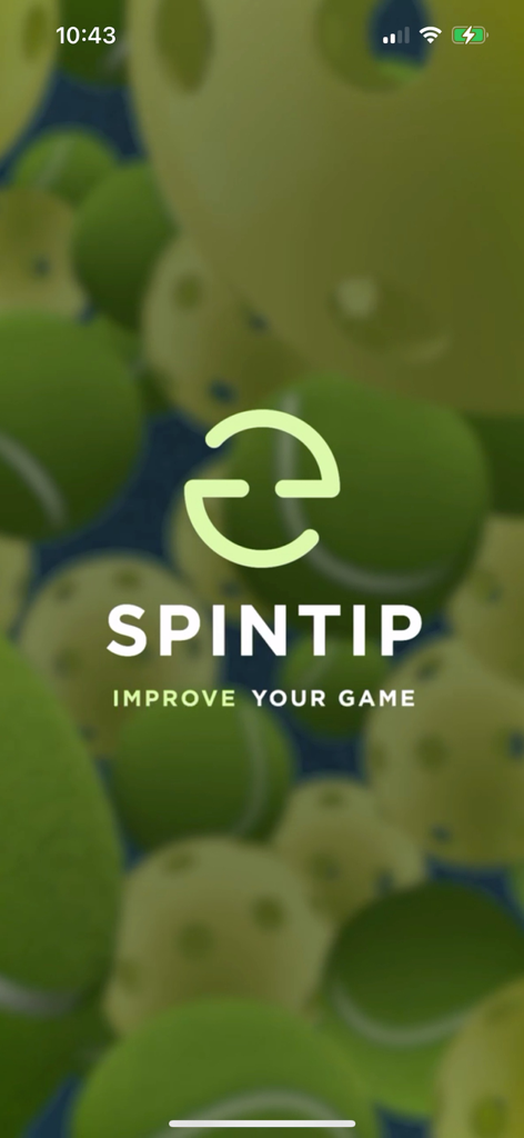 Spintip app splash screen featuring the company logo and tagline Improve Your Game with a background of blurred tennis and pickleballs.