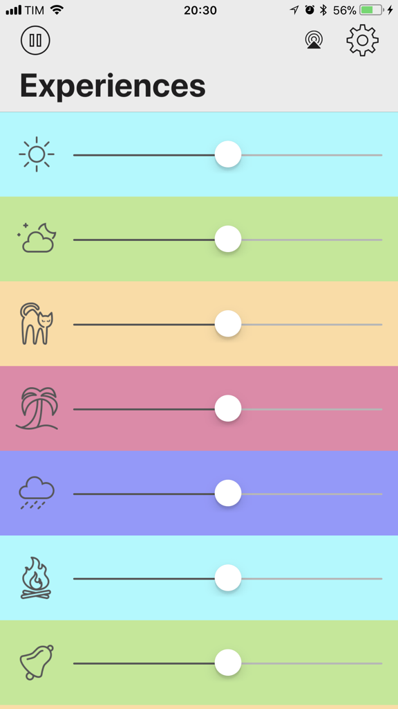 Noisly app interface with colorful sliders to mix ambient sounds like rain and fire