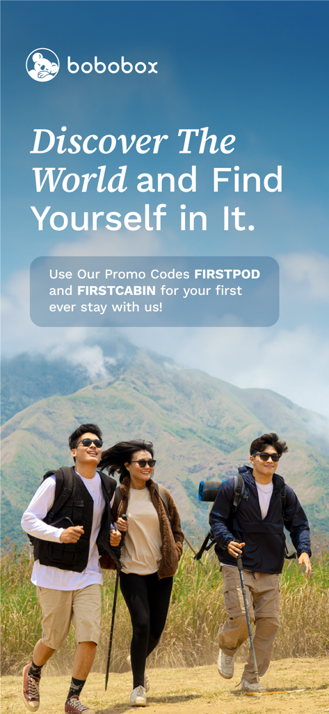 Three young travelers hiking in a scenic mountain landscape with Bobobox app promo codes.