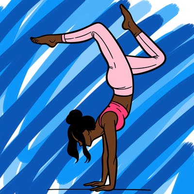 a woman doing a handstand