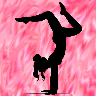 a woman doing a handstand