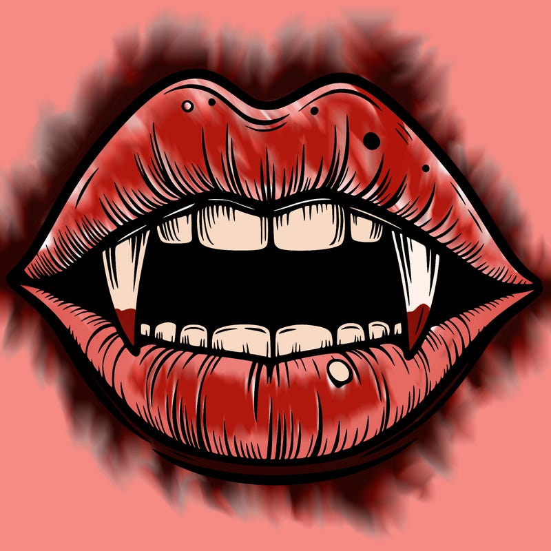 lips with vampire teeth