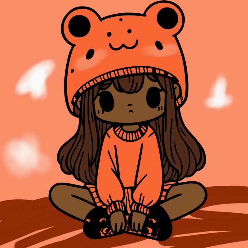 a girl wearing a frog hat and some frog socks