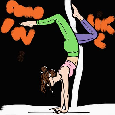 a woman doing a handstand