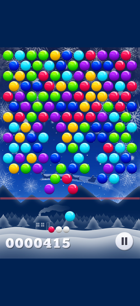 Jugabilidad de Smarty Bubbles XMAS Edition con fondo invernal festivo