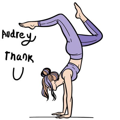 a woman doing a handstand