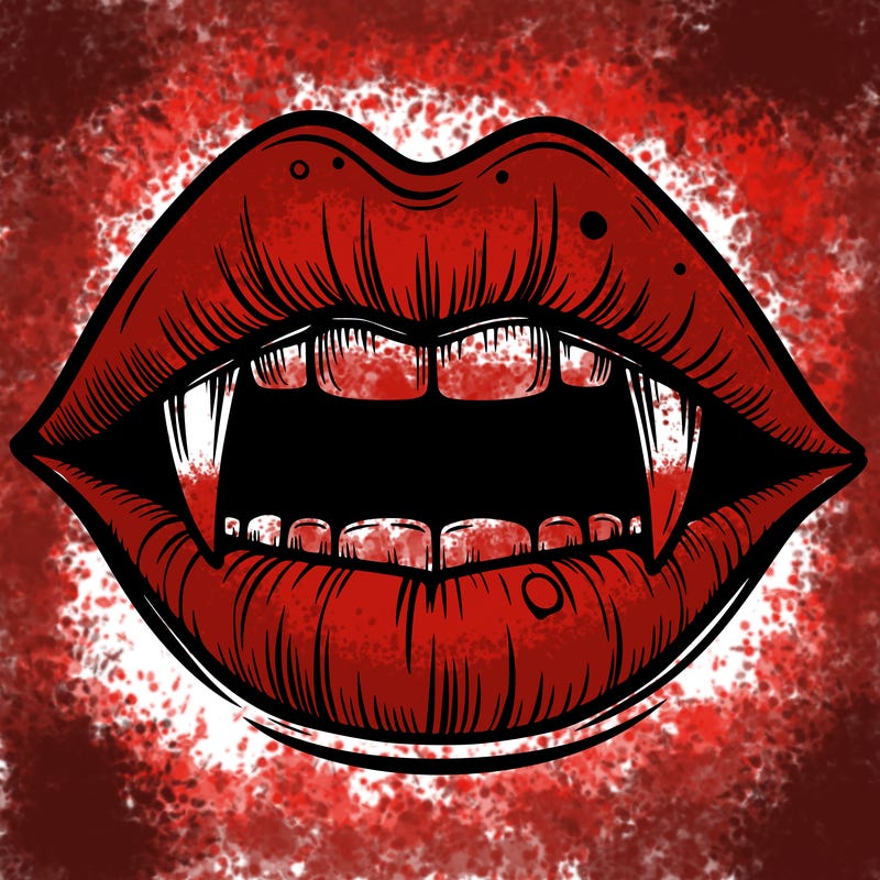 lips with vampire teeth