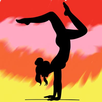 a woman doing a handstand