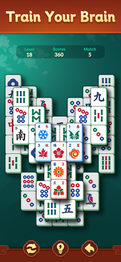 Shanghai Mahjongg Puzzle - Gameplay of Shanghai Mahjongg Puzzle featuring large tiles and a Train Your Brain headline