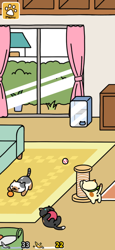 Neko Atsume 2 - Cartoon cats playing with balls and a scratching post in an indoor living room within the Neko Atsume 2 game.