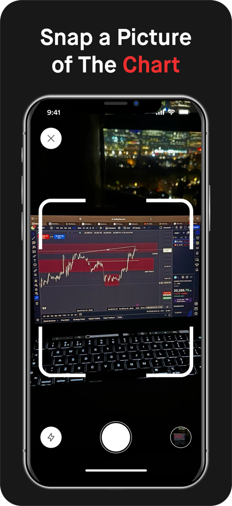 Tradr AI - Trading Bot - Tradr AI mobile app scanning a stock market chart from a laptop screen using the camera.