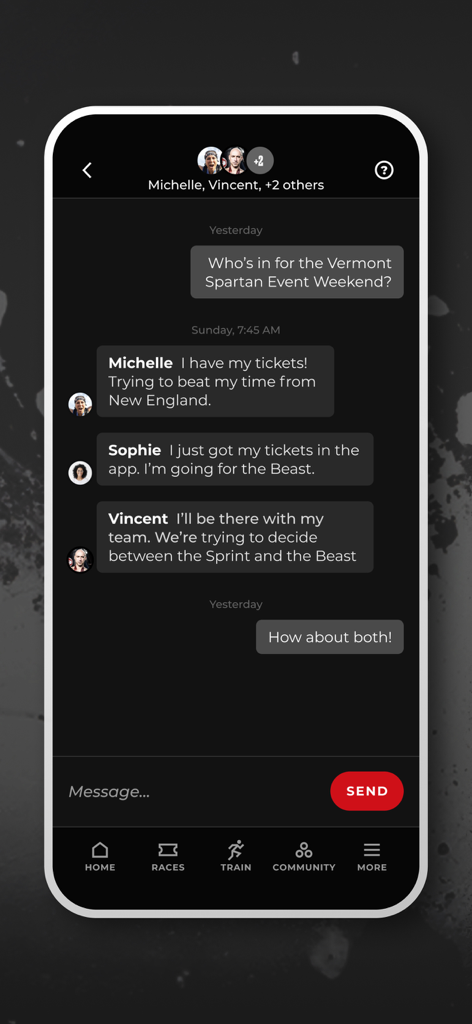Spartan Race - A group chat interface in the Spartan Race app showing community members discussing an upcoming race weekend.