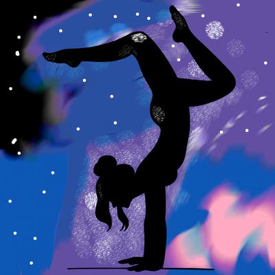a woman doing a handstand