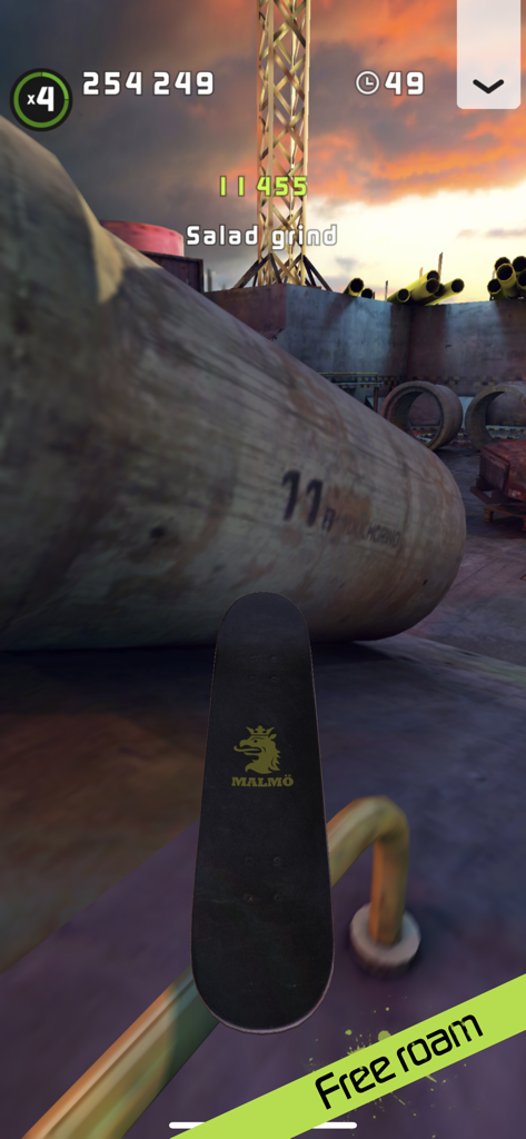 Touchgrind Skate 2 - A skateboard performing a salad grind trick in a 3D urban skatepark within the Touchgrind Skate 2 mobile game.