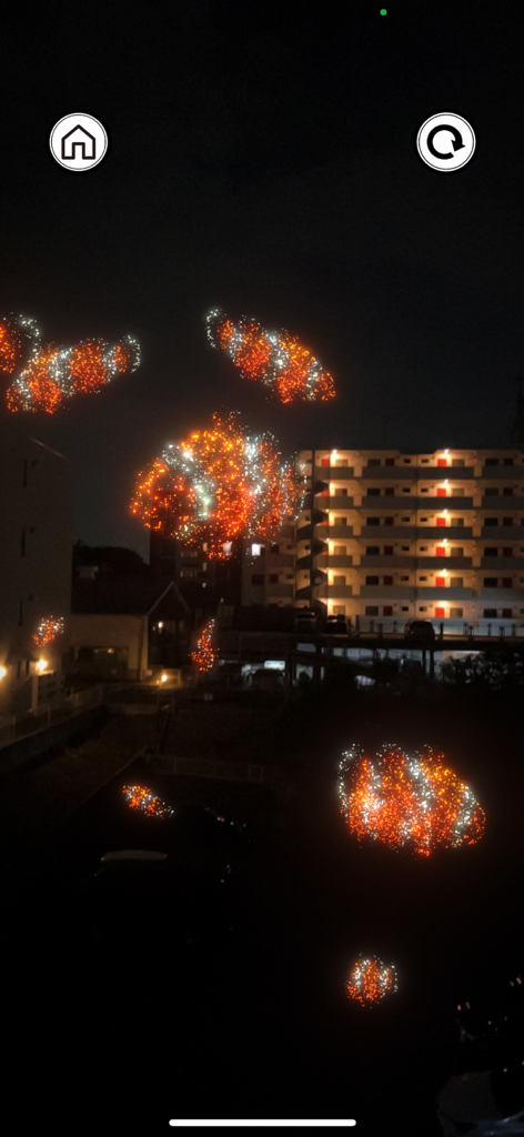 Paraworld - Paraworld app screenshot showing glowing AR clownfish floating in a night city scene