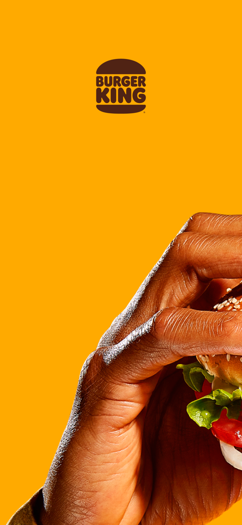 버거킹 - 햄버거 킹오더·딜리버리 - A close up of a hand holding a Burger King burger against a vibrant orange background with the official logo at the top