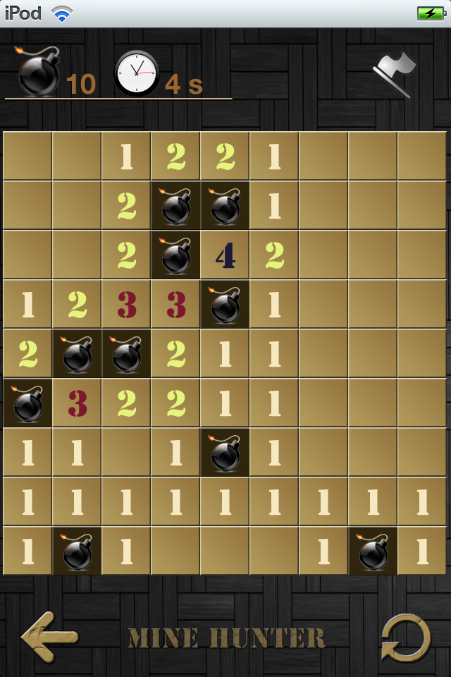 Mine Hunter FREE - Gameplay screenshot of Mine Hunter featuring a traditional Minesweeper board with numbers and bomb icons.