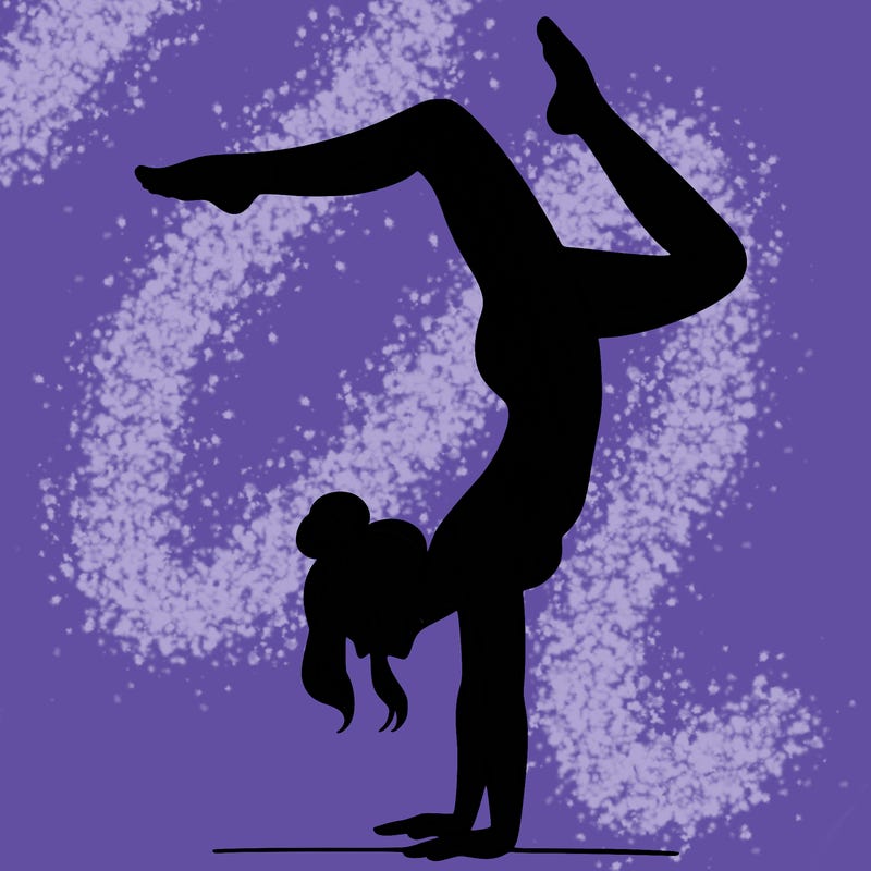 a woman doing a handstand