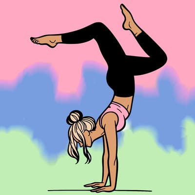 a woman doing a handstand