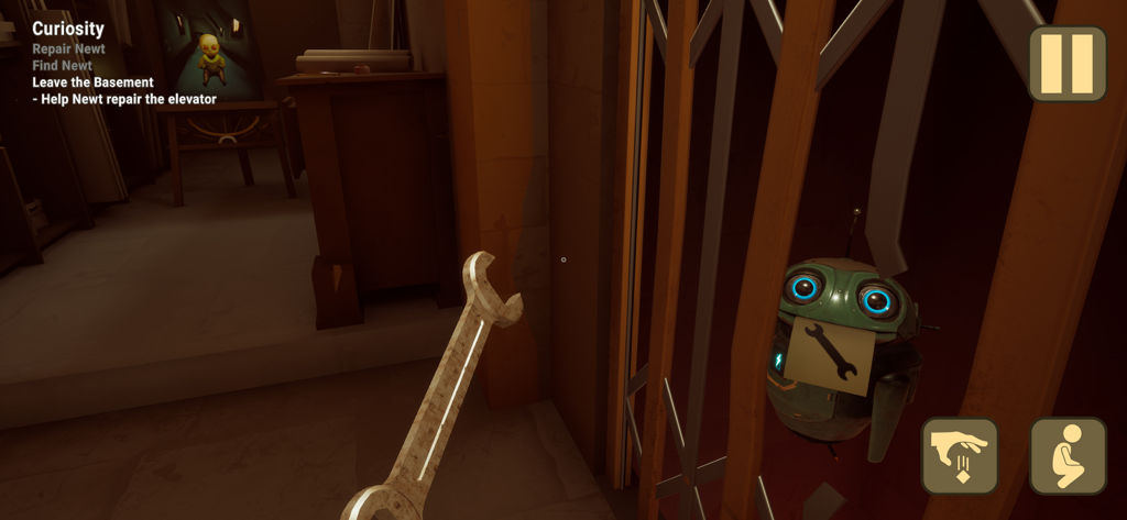 A first-person view of the player holding a wrench to help a small robot behind a gate in a basement level.