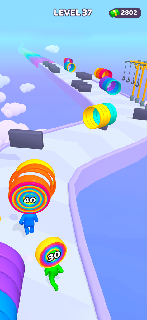 Personajes corriendo y recogiendo aros de colores arcoíris en una pista celeste en Layer Man 3D