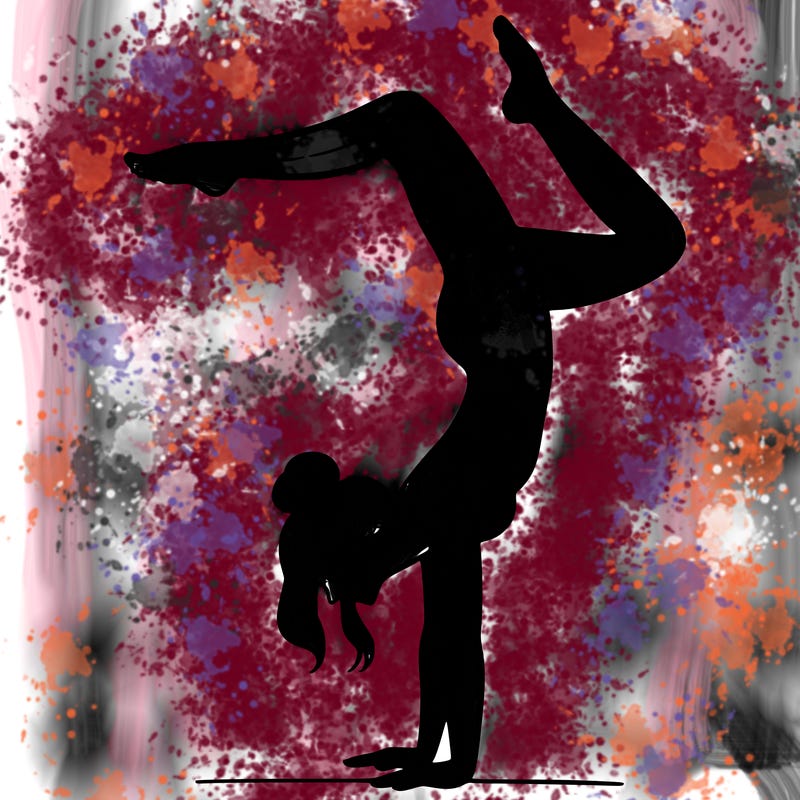 a woman doing a handstand