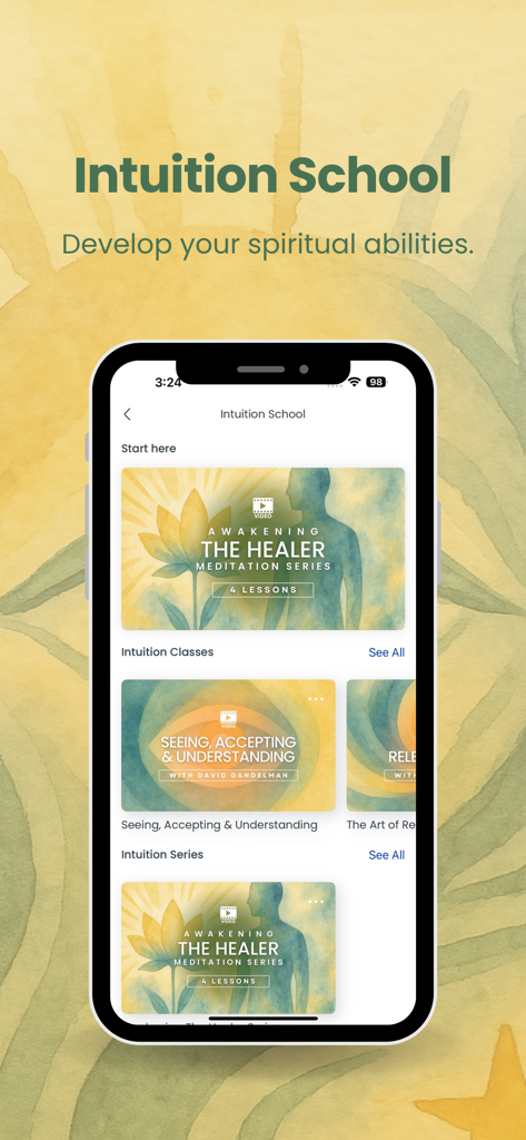 Smartphone montrant la section Intuition School de l'application Meditation School avec des cours de croissance spirituelle