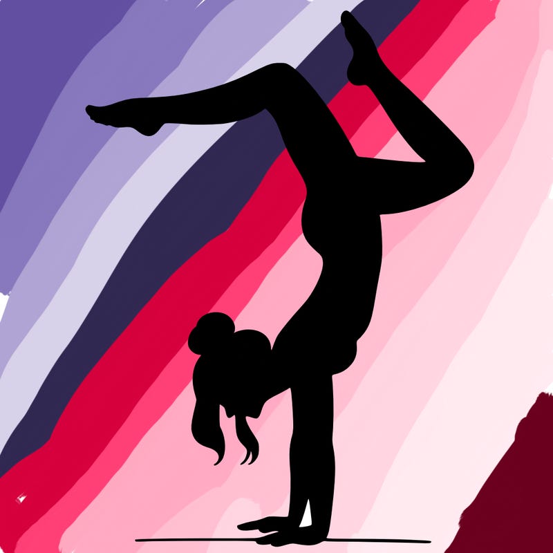 a woman doing a handstand