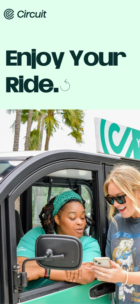 Ride Circuit - A passenger using the Ride Circuit app while interacting with a friendly shuttle driver next to an electric vehicle.