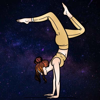 a woman doing a handstand