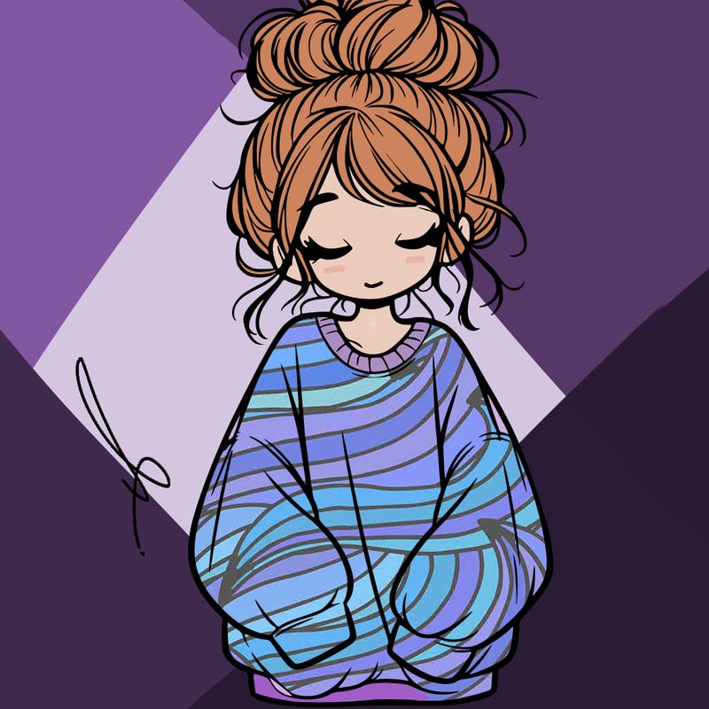 girl with baggy sweatshirt and messy bun