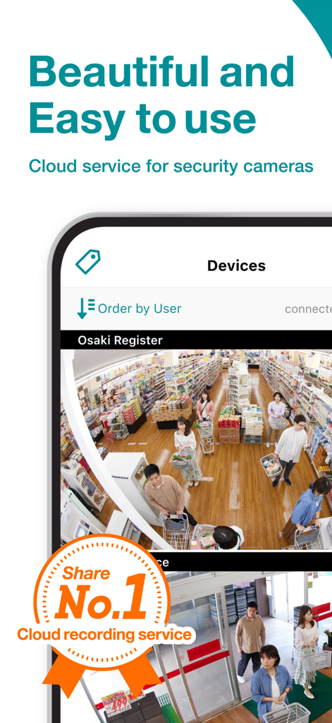 Safie Viewer app on a smartphone displaying live cloud security camera feeds of a retail store layout