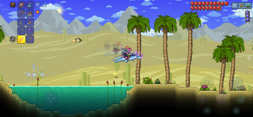 Un personaje montando una montura voladora sobre un oasis desértico en el juego móvil Terraria.