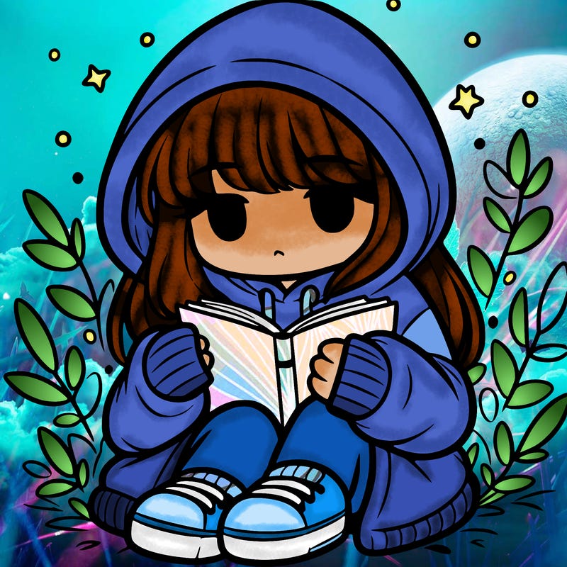 girl in oversized hoodie reading a book