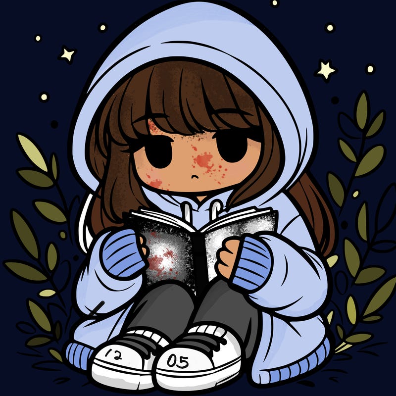 girl in oversized hoodie reading a book