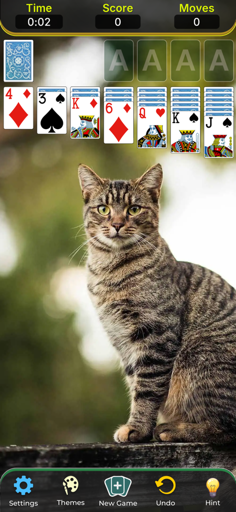 Solitaire Classic Game. - A classic Klondike solitaire game interface featuring a tabby cat background and standard card layout