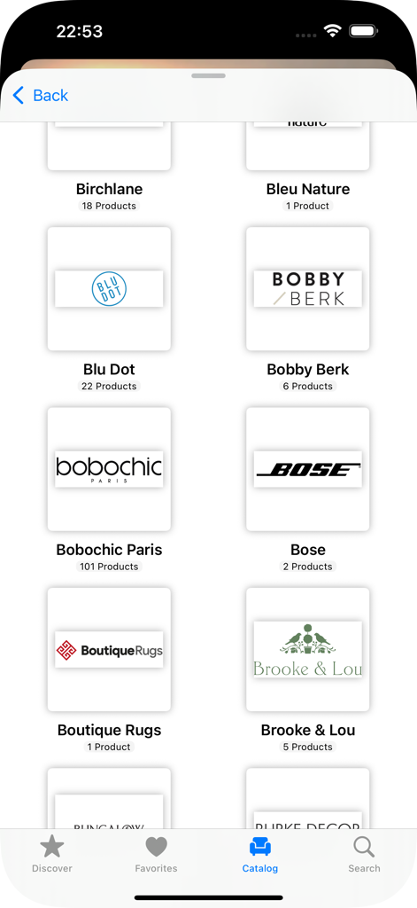 HomeByMe Reality – Deco 3D - A mobile app screen showing a catalog of furniture and decor brands including Blu Dot and Bobby Berk