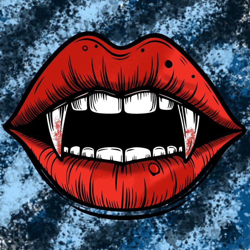 lips with vampire teeth