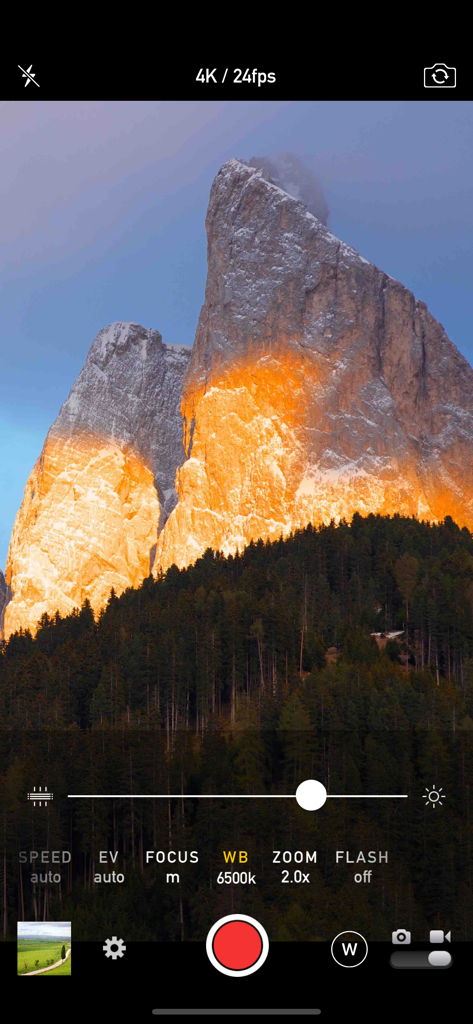 Manual Camera 4 - Smartphone camera app recording 4K video of a glowing mountain peak