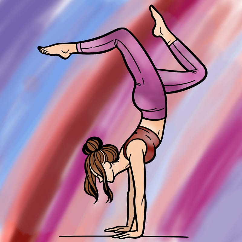 a woman doing a handstand
