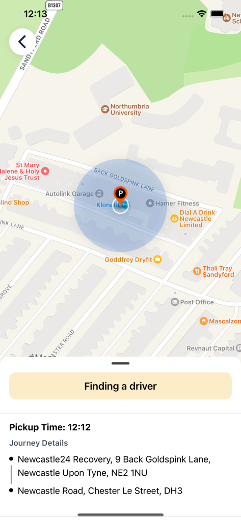 Blueline Taxis - Blueline Taxis app interface showing a map of Newcastle and the finding a driver status